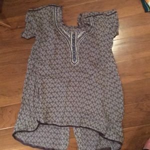 Anthropology holding horses tunic